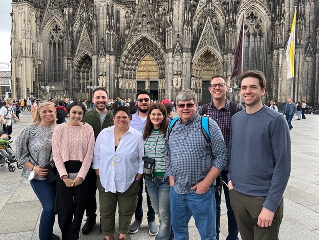 Pam Ortega (second from the left) on her June 2022 RIAS program in Cologne with a group of American fellow travelers: Sheryl Worsley, Omar Atia, Esther Ciammachilli, Brandon Benavides, Katherine Bennett, Scott Neuman, Kevin King and Matt Gregory.